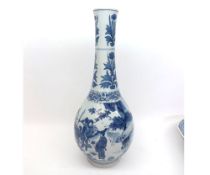 A Chinese large Spill Vase of baluster form, the lower body decorated in under glazed blue with