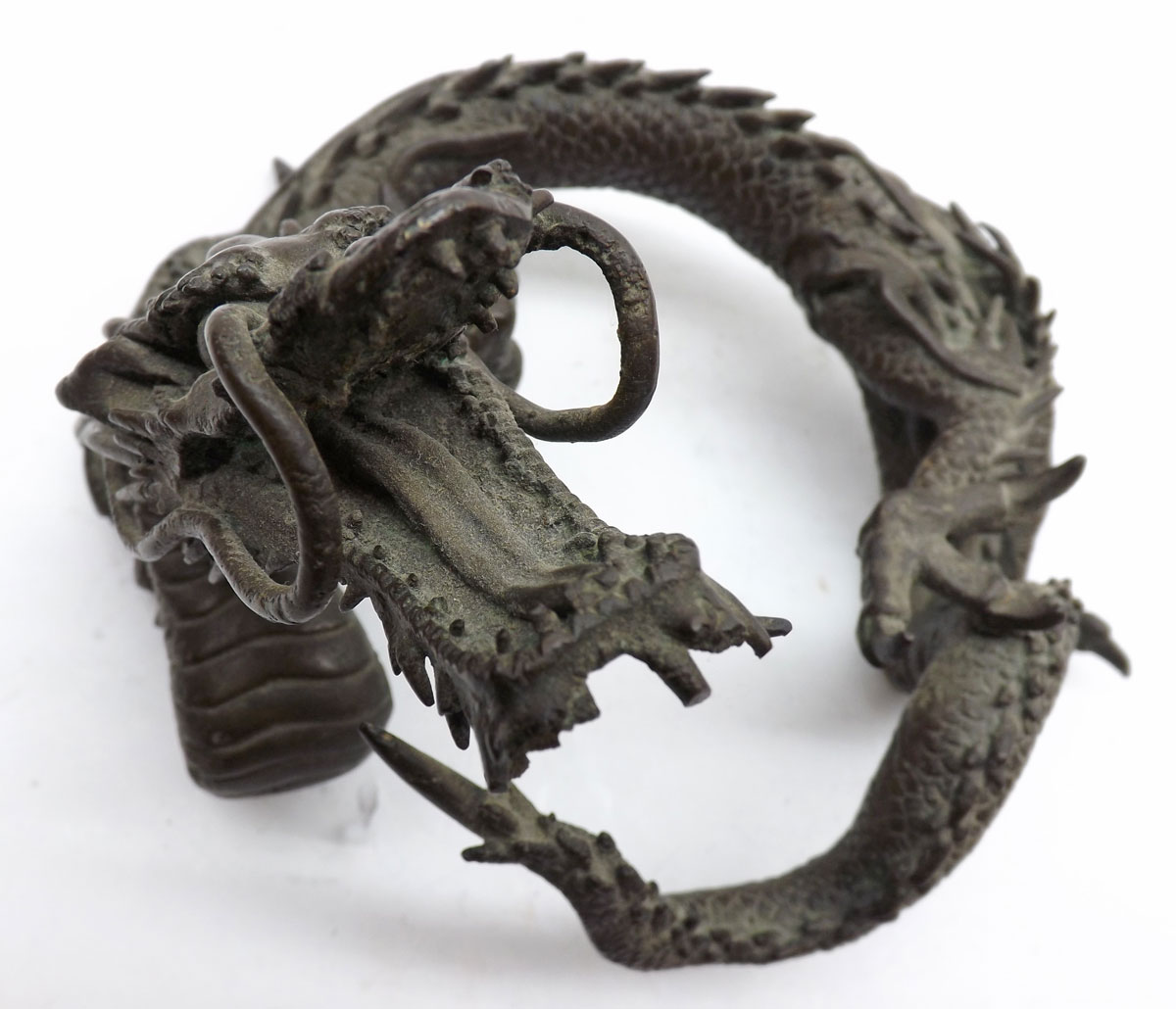 An Oriental Bronze Model of a coiled Dragon, 6? high - Image 6 of 6