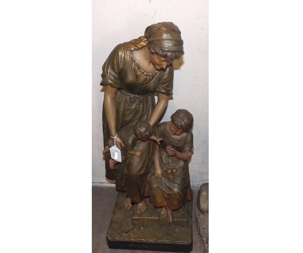 A very large German Plasterwork Group of a mother with children, raised on a square plinth base