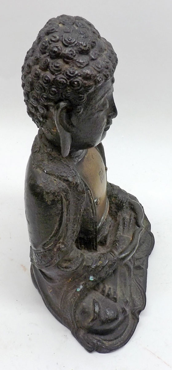 A Tibetan painted Bronze figure of a seated Buddha, his chest applied with a gilt metal plaque with - Image 3 of 7