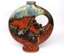 A large Korean Pottery Ewer of flask shape, relief moulded climbing figures with seal mark or