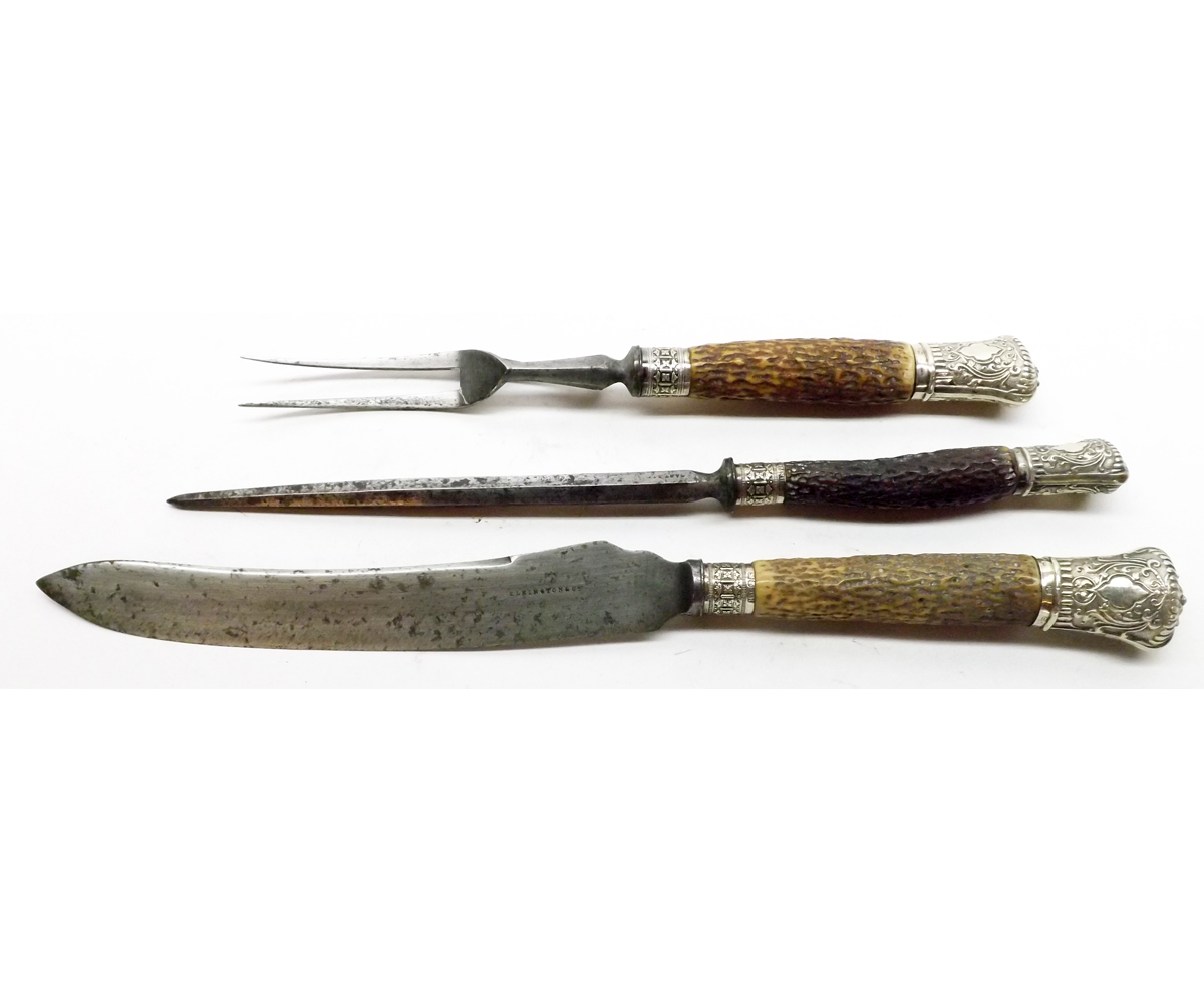 A three piece Horn handled and Silver mounted Carving Set, the Knife 15 ½? long, (3)