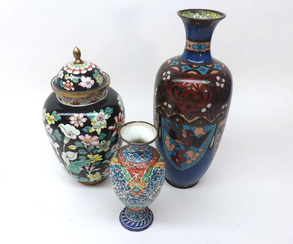 A collection of three Cloisonné/Enamel Vases including one covered Vase and two others, the large