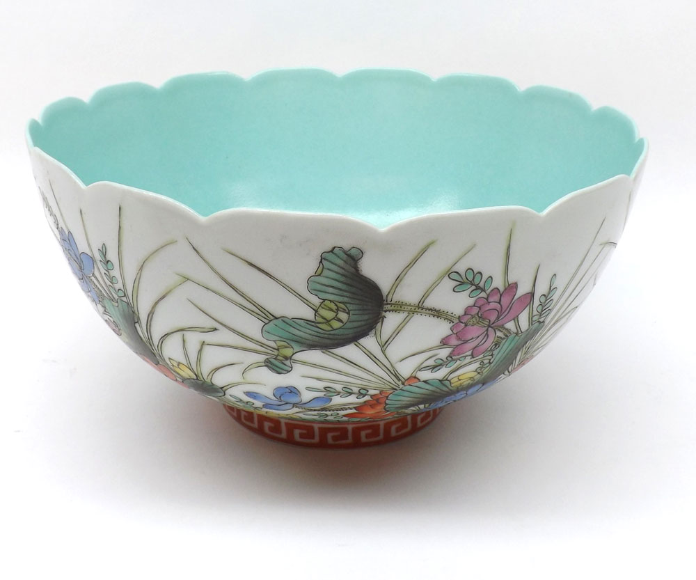 A Chinese Bowl with hipped rim of tapering circular form, painted in under glazed blue with shades