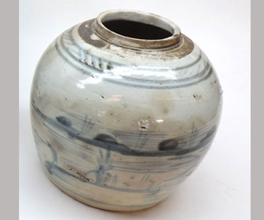 A Chinese Ginger Jar of baluster form (cover missing) naively decorated with Chinese river scene, 6