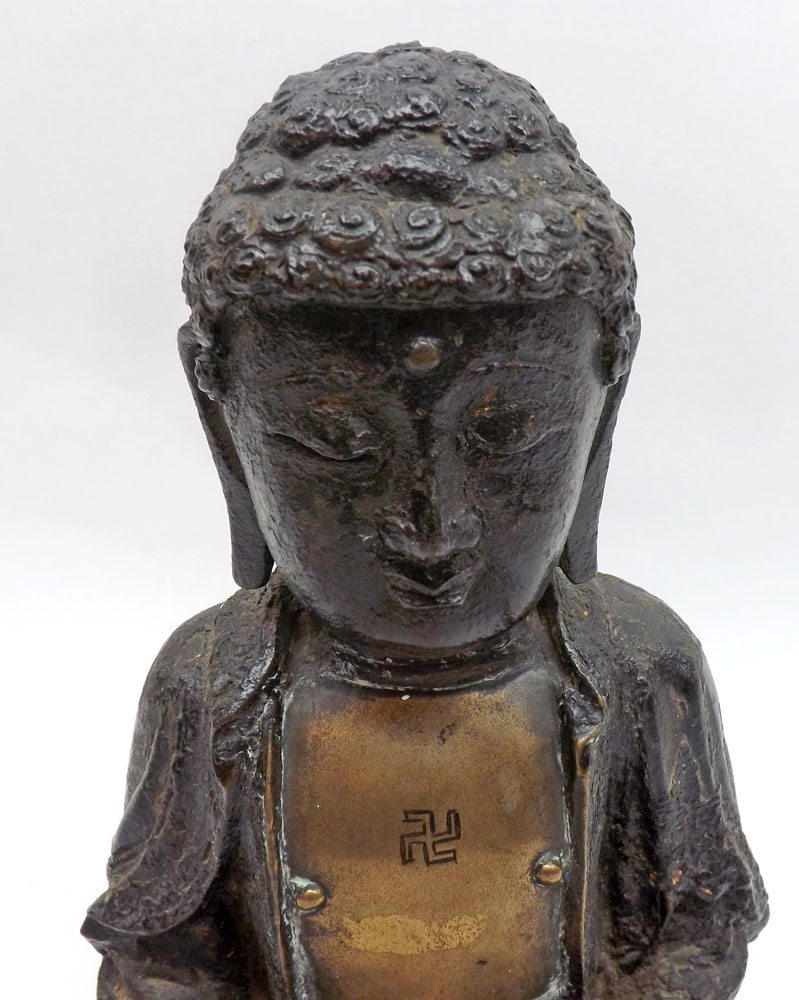 A Tibetan painted Bronze figure of a seated Buddha, his chest applied with a gilt metal plaque with - Image 2 of 7