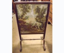 A 19th Century Mahogany Fire Screen, gross point wool embroidered panel depicting a retriever dog