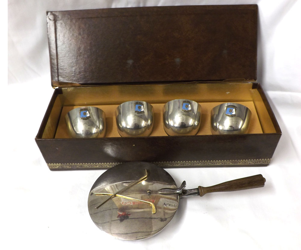 A Cased set of four Pewter Beakers, each with applied enamelled crest reading ?Bob Hope Dessert