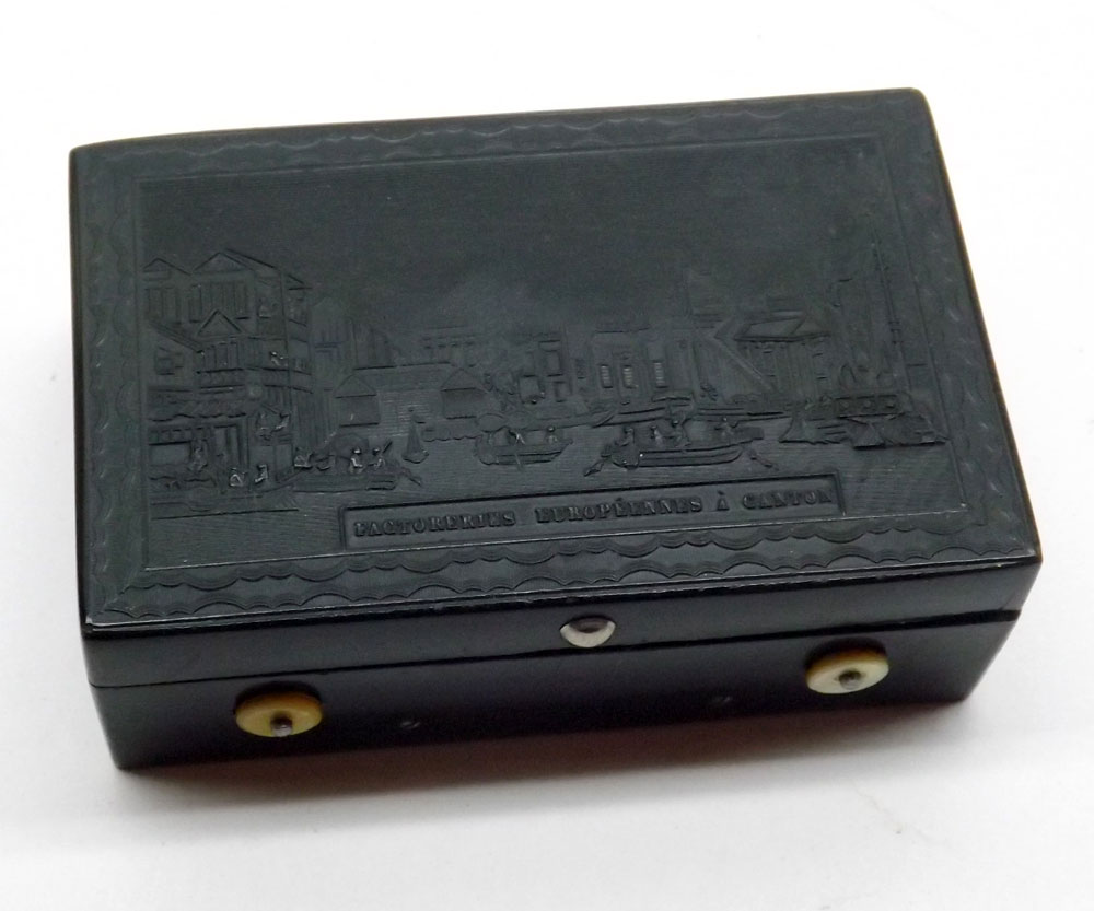 A small Pocket Musical Box in an embossed Bakelite Case, the lid decorated with a titled scene of ? - Image 2 of 2