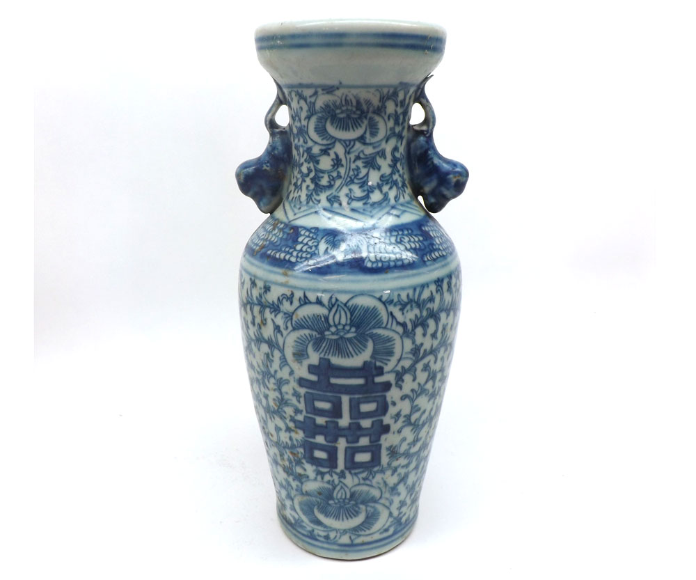 A Chinese baluster Vase, the neck moulded with temple dog handles and decorated throughout in under