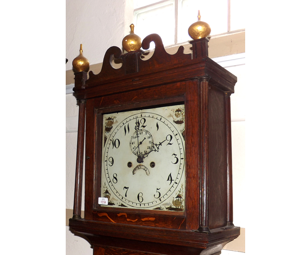 An early 19th Century Oak Long Case Clock, the square painted dial with Arabic chapter ring,