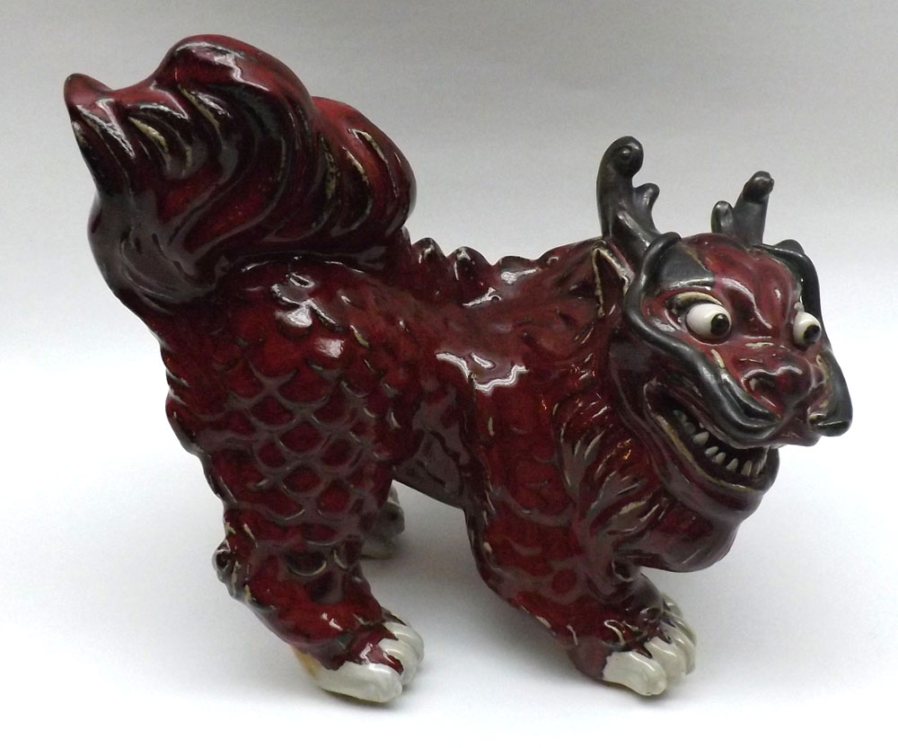 An unusual Chinese red glazed Ceramic Dog of Fo, no marks apparent, 9? high