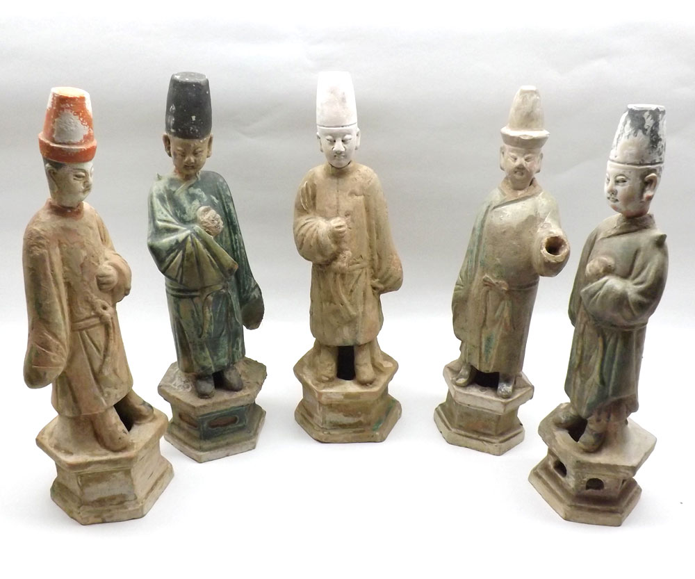 A group of five Chinese Tang style Figures, all modelled as various cloaked gents, raised on plinth