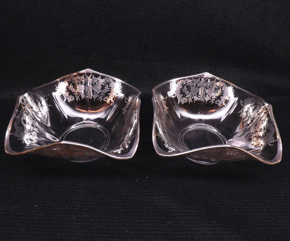 A pair of Clear Shaped Square Glass Dishes, decorated with overlaid white metal detail, 7? wide