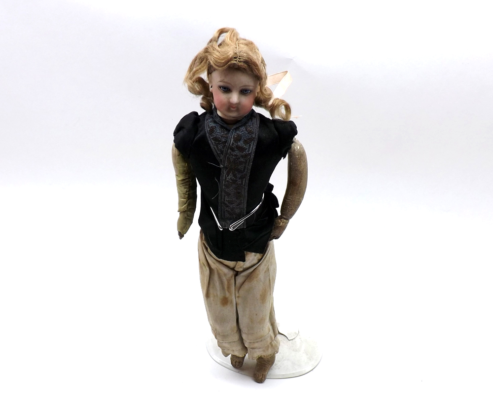 A late 19th/early 20th Century Small Bisque Socket Head and Shoulder Plate Doll (possibly French),