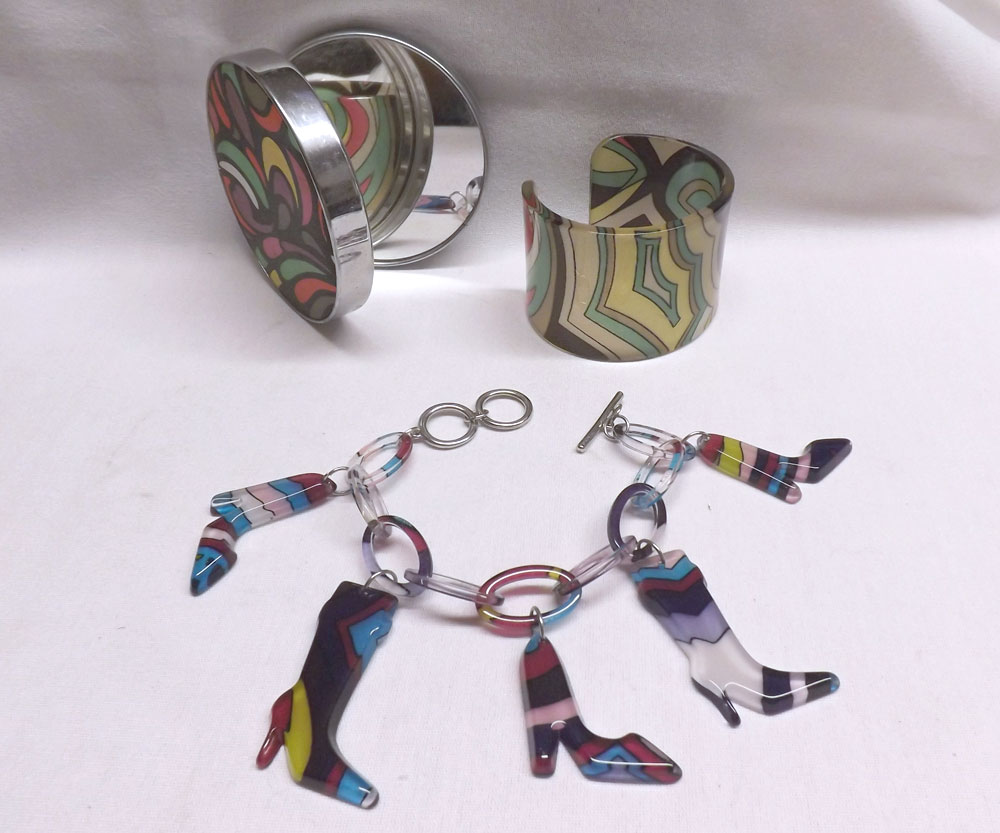 A Packet of ?Pop? Jewellery including Bangle, Bracelet and Travelling Mirror (3)