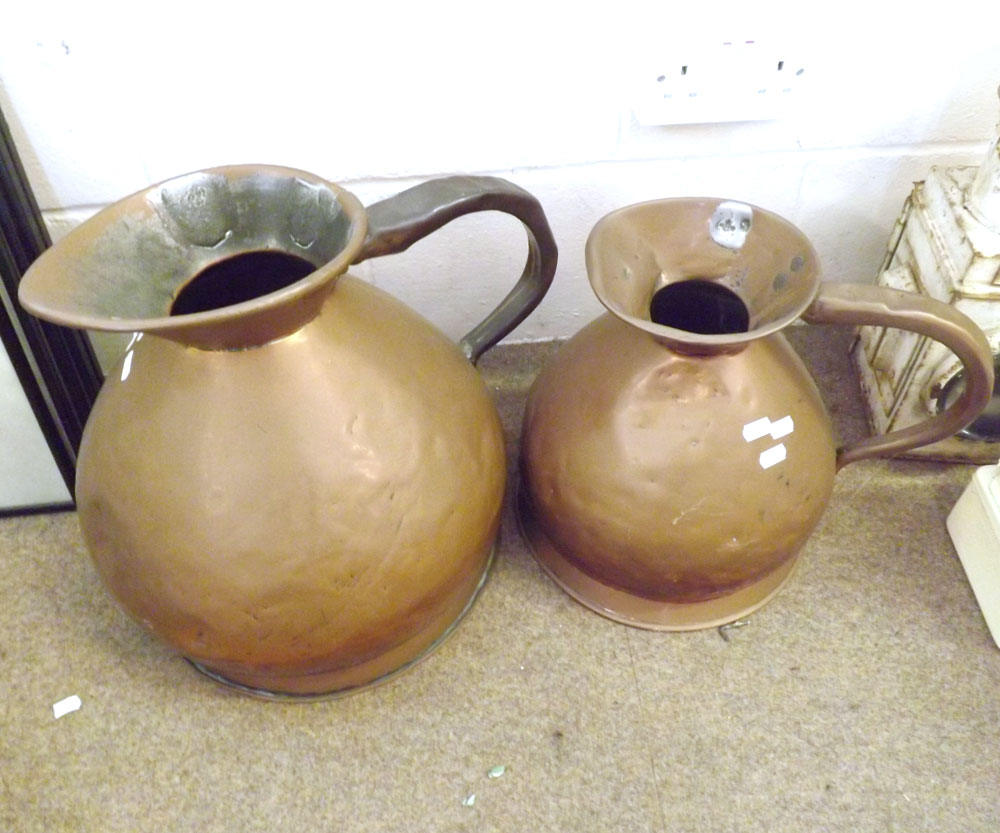 A graduated set of two Victorian Large Copper Measures, 4 gallons and 2 gallons, each of conical