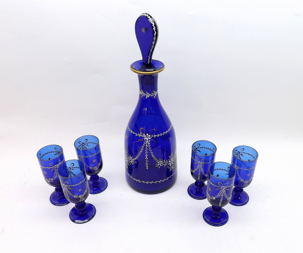 A late 19th Century Bristol Blue Mallet-shaped Decanter, with flattened stopper, decorated with