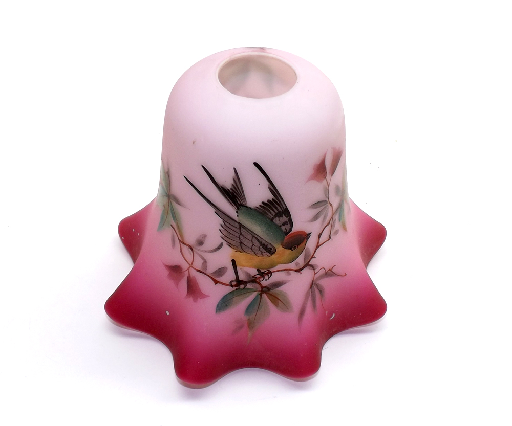 An Antique Opaque Frilled Glass Lightshade, decorated with bird amongst foliage on a pink