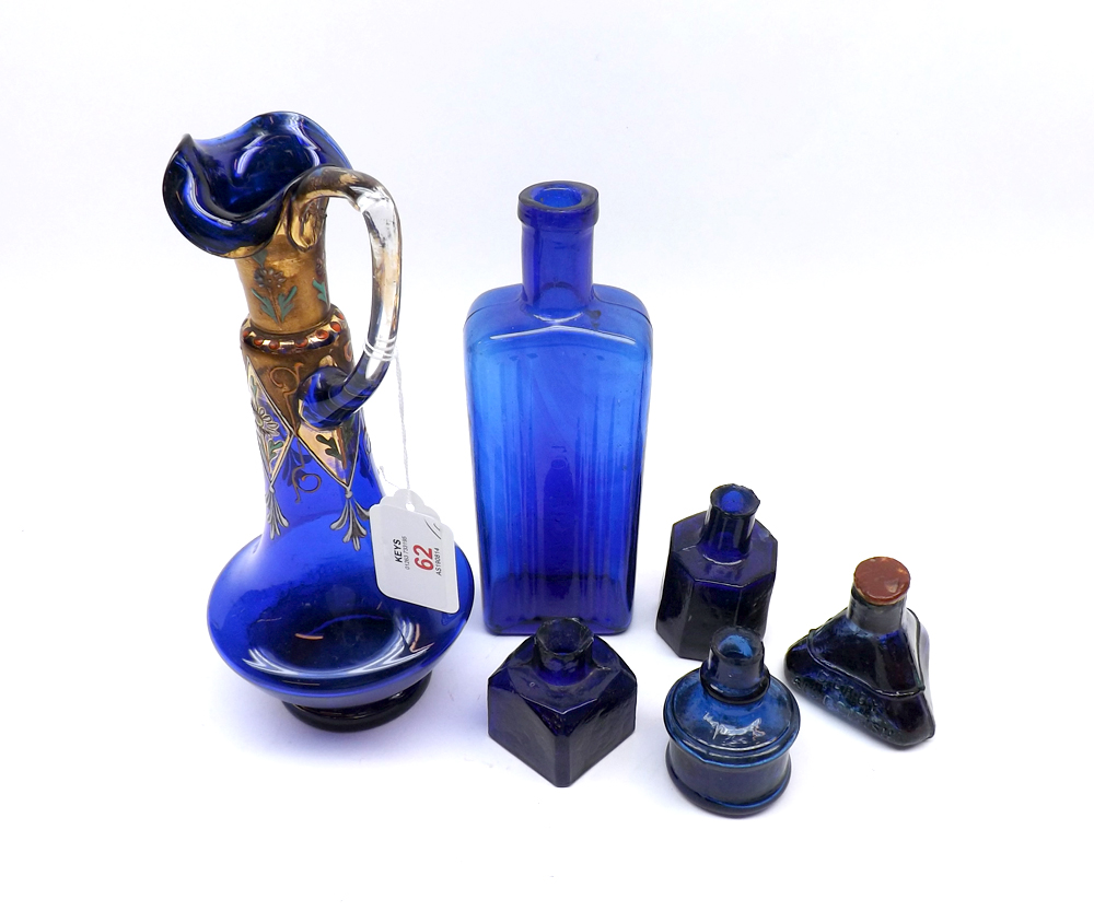 A Murano style blue Glass Ewer with gilded and decorated neck and handle, a vintage blue Glass