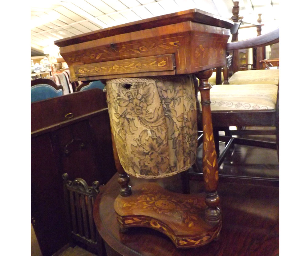 A 19th Century Mahogany Work Table of rectangular form, ornately inlaid throughout with panels of