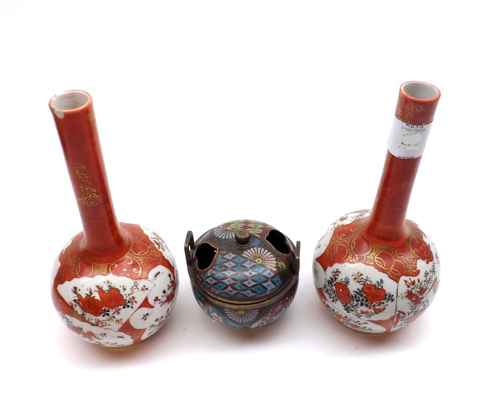 A pair of Kutani Balustered Spill Vases, typically decorated in iron red with exotic birds and