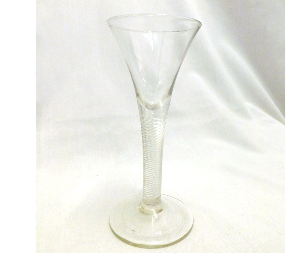 An 18th Century air twist Wine Glass with spiral air twist stem and spreading circular foot, circa