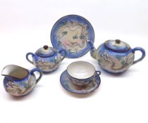 An Oriental Eggshell China Tea Service, all with raised relief decoration of dragons and smoke