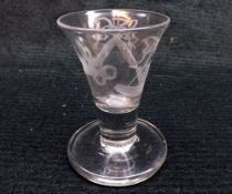 An 18th Century Masonic Firing Glass, the tapering bowl engraved with Rule, Sun and Compass etc,