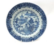 An 18th Century Chinese Circular Plate, the centre typically painted in underglaze blue with a