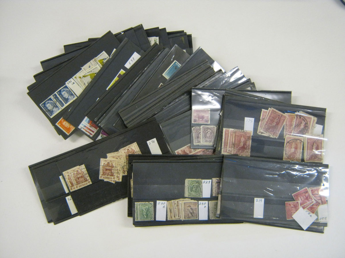 A shoebox containing a good quantity Australia, mainly used on stock cards, much duplication