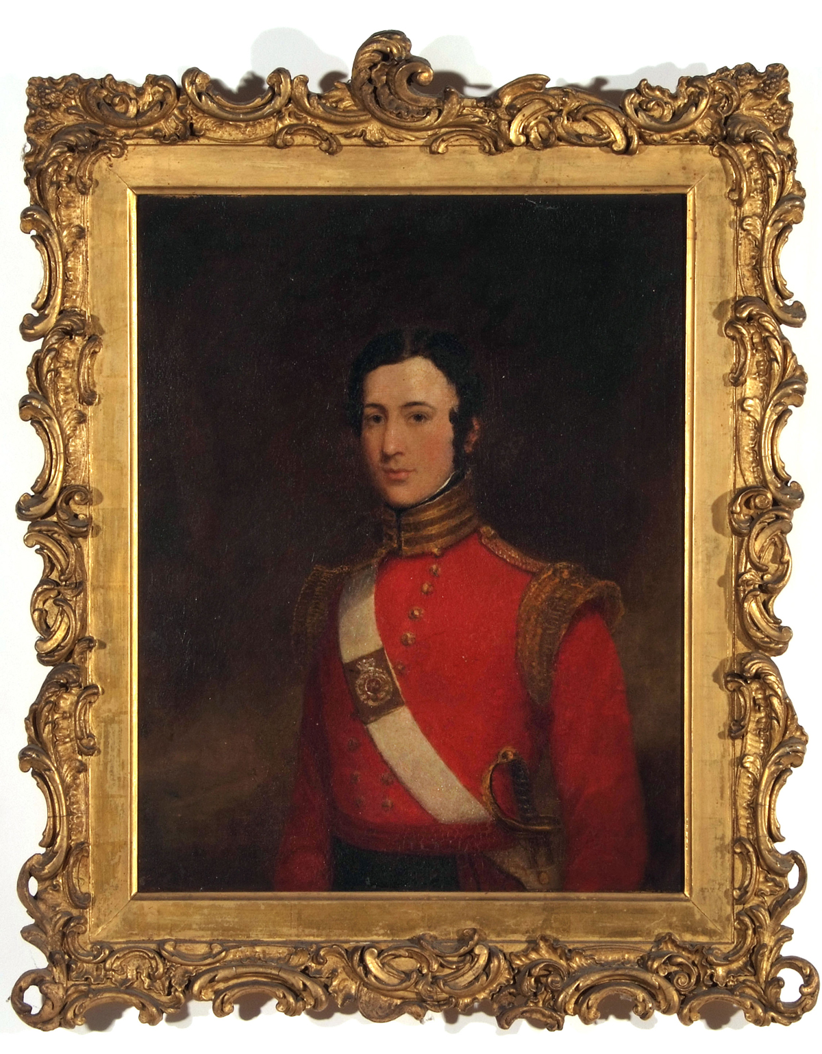 ENGLISH SCHOOL, (19TH CENTURY) Portrait of an Army Officer in red Tunic  oil on canvas  17 x 13ins