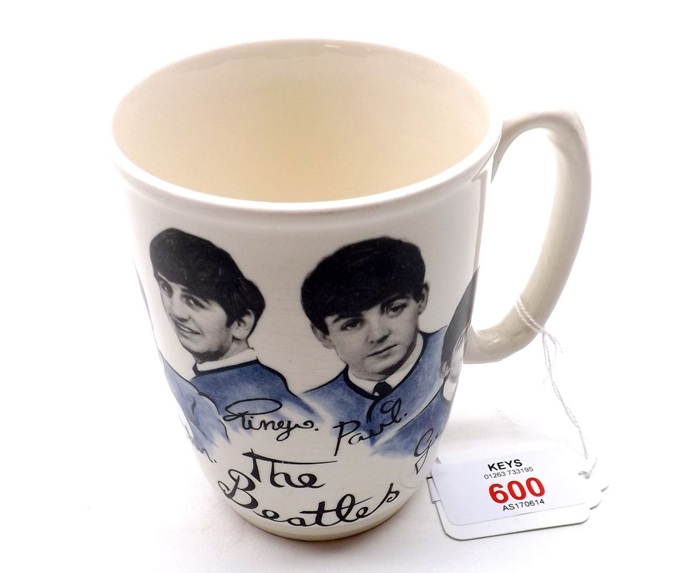 A mid-20th Century Broadhurst Pottery Mug, transfer printed with John, Paul, Ringo and George, The