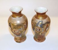 A pair of Satsuma Baluster Vases, brightly decorated in typical colours with immortals, (one with