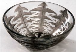 A small Clear and Frosted Glass Round Bowl, decorated with a design of dandelion leaves, marked to