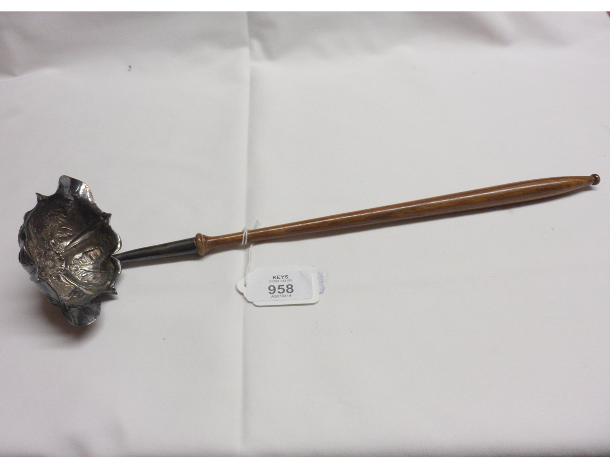 A George II Silver Punch Ladle, the bowl with floral decoration and apparent repairs, marks