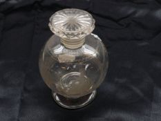 An unusual 19th Century Squat Clear Glass Scent Bottle, with screw-on lid, body decorated with an