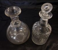 An early 19th Century Clear Glass Round Decanter, decorated with ribbed detail; together with a