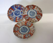 A collection of three Japanese Imari Plates, comprises two of octagonal form and one of crimped