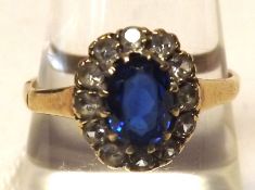A Blue and White Stone Cluster Ring, yellow metal stamped “9ct”