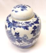 A Chinese Covered Ginger Jar of typical globular form, painted throughout in underglaze blue with