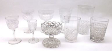 An Extensive Suite of Edwardian Drinking Glasses, comprising eleven Champagne Bowls, twelve small