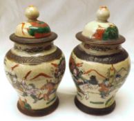 A pair of Chinese Crackle Glaze Lidded small Jars, of baluster form, typically decorated with