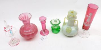 A Mixed Lot: four assorted Coloured Glass Vases to include with Mary Gregory type decoration; and