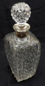 A 20th Century Clear Cut Glass Square Spirit Decanter, fitted with a white metal collar, 10” high