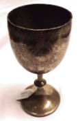 A large Victorian Goblet, decorated with chased design of floral sprays, the knopped stems with