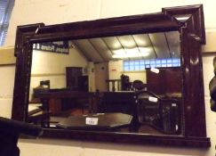 An early 20th Century Overmantel Mirror, in burr walnut frame, 27” wide