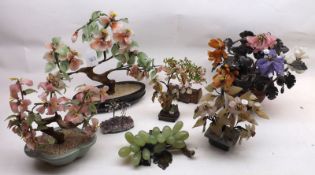 A collection of seven various Oriental Glass/Composition Floral Ornaments, including Grapes,