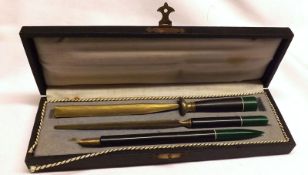 A Boxed 20th Century Desk Set, of paperknife, seal and wax, and nib pen, nib marked “R Ester”, cased