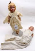 An early 20th Century Schouneau & Hoffmeister Bisque Socket Head Fairy Doll, with blue weighted